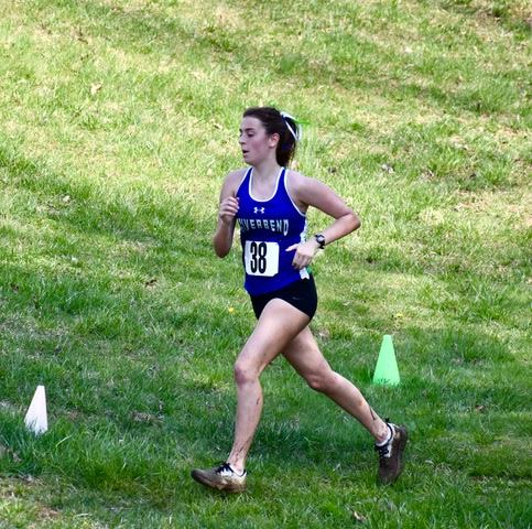 Freshman Anna Labrusciano races at the district cross country meet